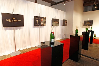 Inside the venue, Moët & Chandon signage formed a mock step-and-repeat behind the red carpet.