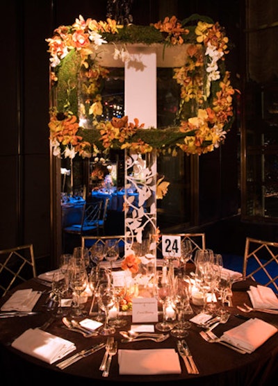 Interior designer David Kleinberg's setting had a sculptural feel, with a lampshade-like structure laced with orchids.