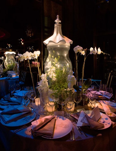 Michael Tavano's table included white Chinoiserie statuettes surrounding a hurricane-turned-terrarium topped with a pagoda-like cap.