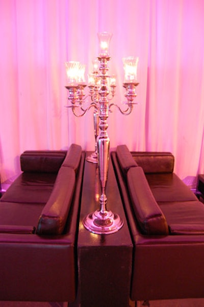Tall silver candelabras topped tables in the lounge area.