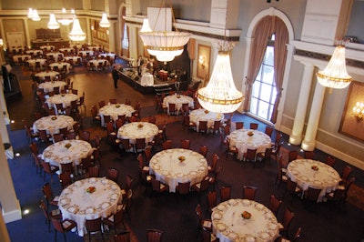 White linens topped tables in the dining room, which featured minimal decor.