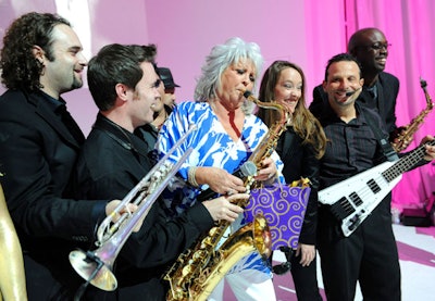 Paula Deen returned to the Paris Theatre to host a Harrah's Casino Night on Friday at one point taking a break to have some fun with the evening's entertainment, Private Stock Band.