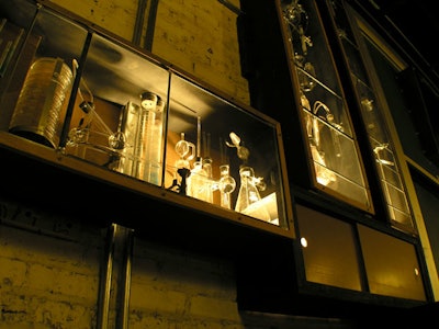 Vintage beakers and test tubes adorn Simone's Lab, an area that was designed to host events.