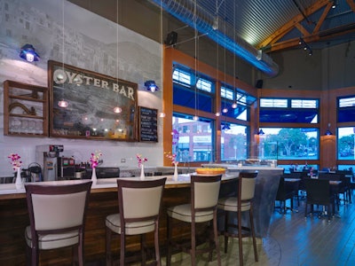 The new Santa Monica Seafood space features an oyster bar.