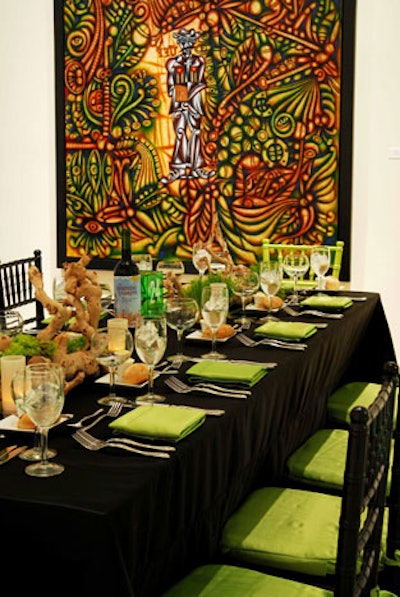 The green gallery featured organic centerpieces and rectangular dining tables.