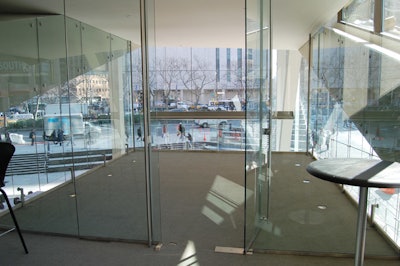 Enclosed in glass, a section of the Hauser Patron Salon overlooks the expansive new lobby.