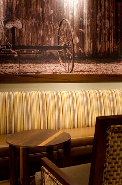 A sepia mural on one of the dining room's walls depicts a farm scene.