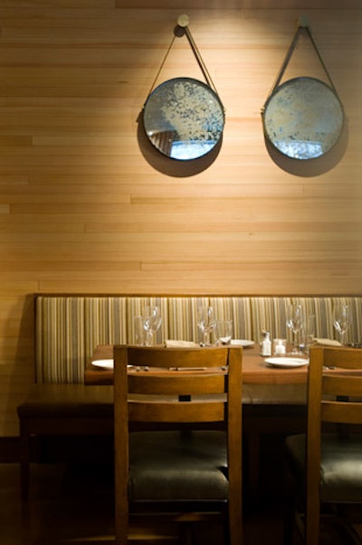 The venue features natural hardwood walls.