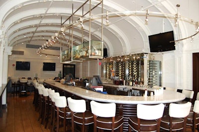 The 54-seat bar features a Victorian-style vaulted ceiling and ornate plasterwork.