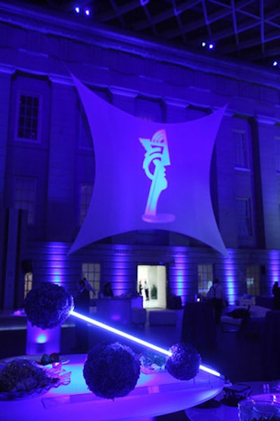 A 25-foot-tall projection of 'Modern Head' showed on stretched spandex against one wall.