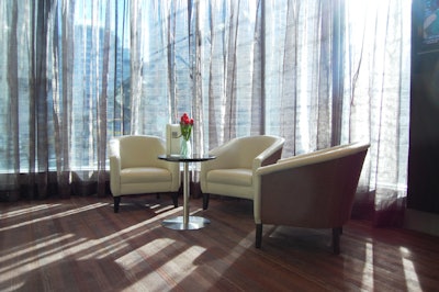 Sheer gray fabric covers the windows facing King Street West in the lobby lounge.