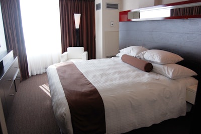 The hotel's 394 guestrooms are outfitted with 42-inch flat-screen televisions, multimedia interface jack boxes, iHome docking stations, Hyatt grand beds, and spa-inspired washrooms with Portico bath amenities.