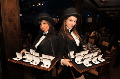 Girls dressed in top hats and tails sold cufflinks from Aquarius Menswear along with raffle tickets.