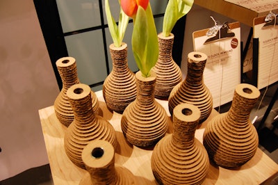 More than half the objects crafted by David Stark were functional, including vases made from laser-cut cardboard. (Glass test tubes inside allow users to fill the flower holders with water.)