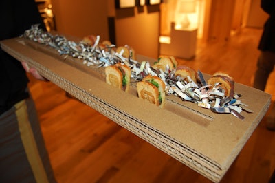 Catering trays used by Creative Edge were also made with old boxes and shredded pieces of West Elm's old catalogs.