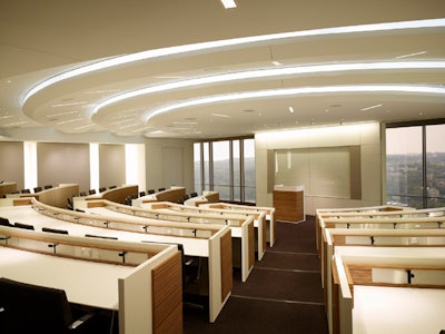 The tiered Cityview classroom holds 57 and, like most Waterview rooms, features built-in LCD projectors and screens.