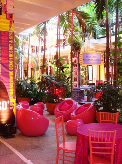 Bubble Miami provided hot pink bucket-style seating in the '80s area sponsored by the Eden Roc hotel.