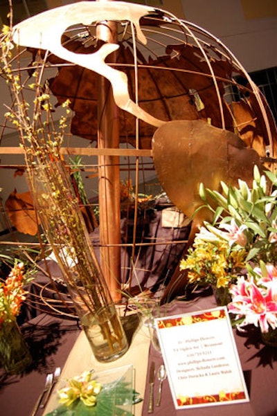 In the Tablescapes portion of the show, Phillips Flowers's design features a giant globe and stargazer lilies.