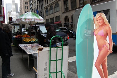 The Travel Channel placed cardboard cutouts of Marquardt around the city and branded the umbrellas of street vendors.