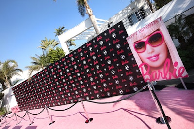 A pink carpet welcomed guests.
