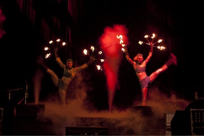 Circus Orange performed a fire dance on the main stage.