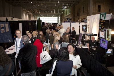 Attendees and exhibitors exchanged ideas on the packed show floor.