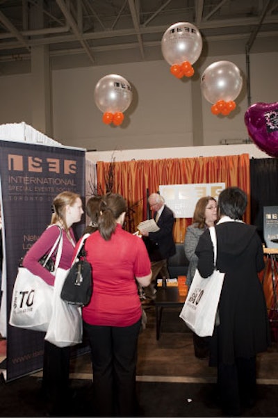 Planners visited ISES's booth for information.