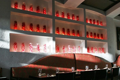 Mamajuana Cafe's signature orchid wall lines the main dining room.