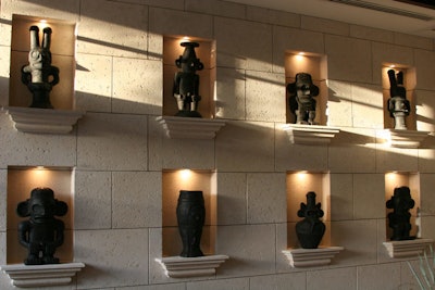 Hand-carved Taino Indian statues line the back wall of the bar area.