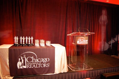 The awards ceremony took place in the hotel's ballroom, where the association's logo adorned the lectern and linens.