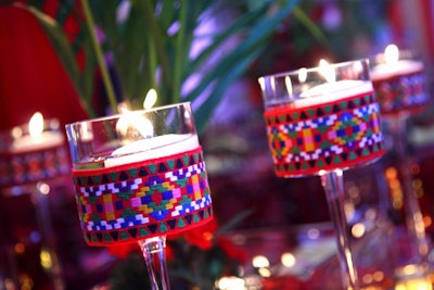 Handwoven Peruvian ribbons wrapped the tabletop candles.