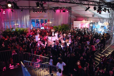 Mannequins dressed in pink Barbie T-shirts and newspaper skirts lined the window along the front of the tent, lit in pink for the opening night show at LG Fashion Week.