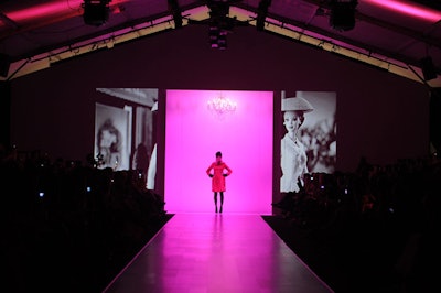 Images of Barbie through the ages screened on the back wall and pink lighting lit the runway for David Dixon's Barbie collection.