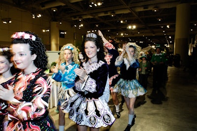 Costumed dancers from the Gilchrist School of Irish Dancing led a parade from the entrance to the main stage for the opening ceremony.