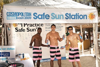 The mag's 'sunscreen ambassadors' (read: shirtless male models) applied airbrush sunscreen to participants throughout the day as part of Cosmopolitan's 'Practice Safe Sun' campaign.