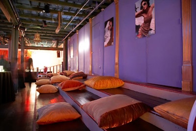 Giant pillows set up on the balcony's wide stairs provided more casual seating for many of the guests.