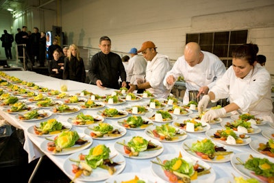 Jackson Catering prepared a first course of citrus-braised spring baby vegetable salad, burrata, coriander, and butter lettuce.