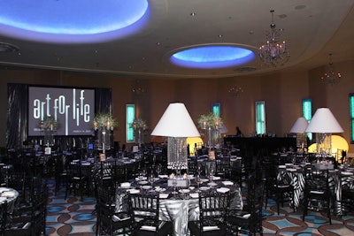 Sutka Productions used a black, white, and silver color palette in both ballrooms.