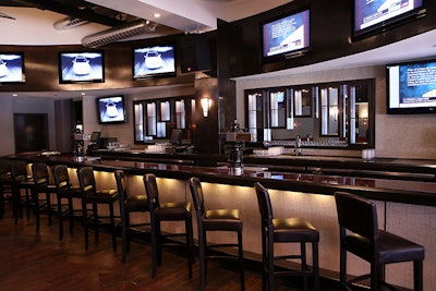 Flat-screen TVs in the central bar area hook up to laptops and DVD players and can broadcast corporate logos.