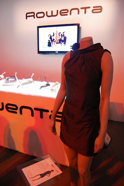Designs from Project Runway Canada adorn mannequins at Rowenta's booth.