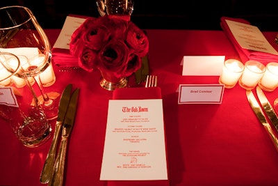 Almost every element of the dinner was red in color—from tablecloths and napkins to velvet seat cushions and small arrangements of roses.