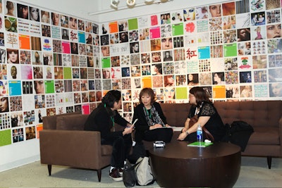Lounge seating surrounded by wall art served as a place for guests to relax between seminars.