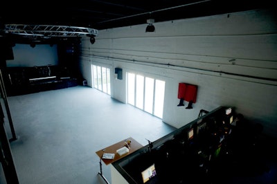 The mezzanine level above the recording studio overlooks the first floor and DJ booth.