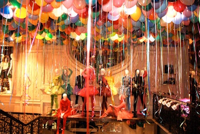 Clever Ceiling CoverBalloons seem like a basic birthday party prop, but when clustered together and elevated to the ceiling, they lent dramatic impact at the launch of Juicy Couture's flagship store in New York in November.