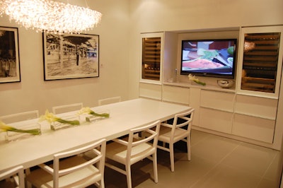 An all-white boardroom will be used for dinner parties with clients.