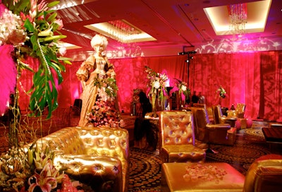 E Squared Concepts added pink drapes to the walls and nearly $25,000 in flowers to the design when the outdoor event was moved to a ballroom.