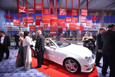 Two Mercedes-Benzes were included in the $100-per-ticket raffle.
