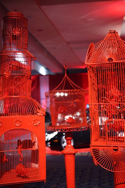 Red birdcages functioned as decor elements.