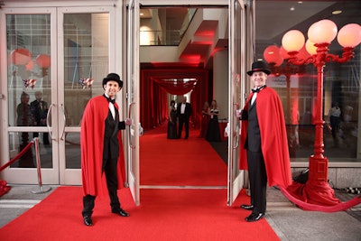 Red-caped attendants greeted guests at the door.