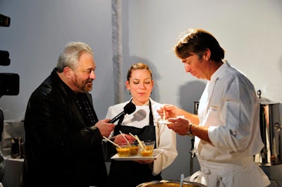 Chef John Besh from Restaurant August described his soupe de poisson for a camera crew.